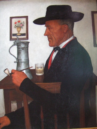 Un vieil Alsacien assis avec une pipe a la main
